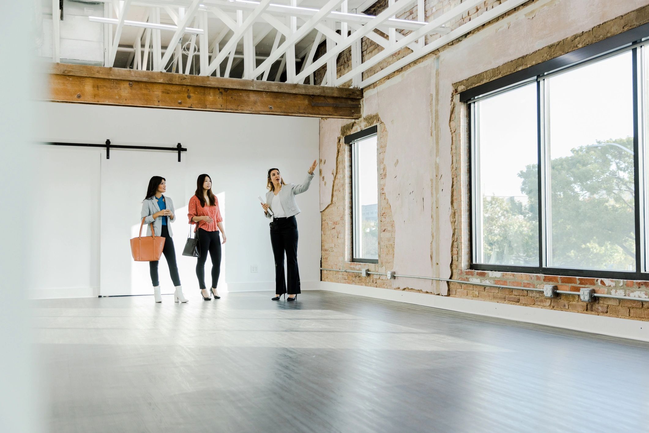Real estate agent explaining property details to clients